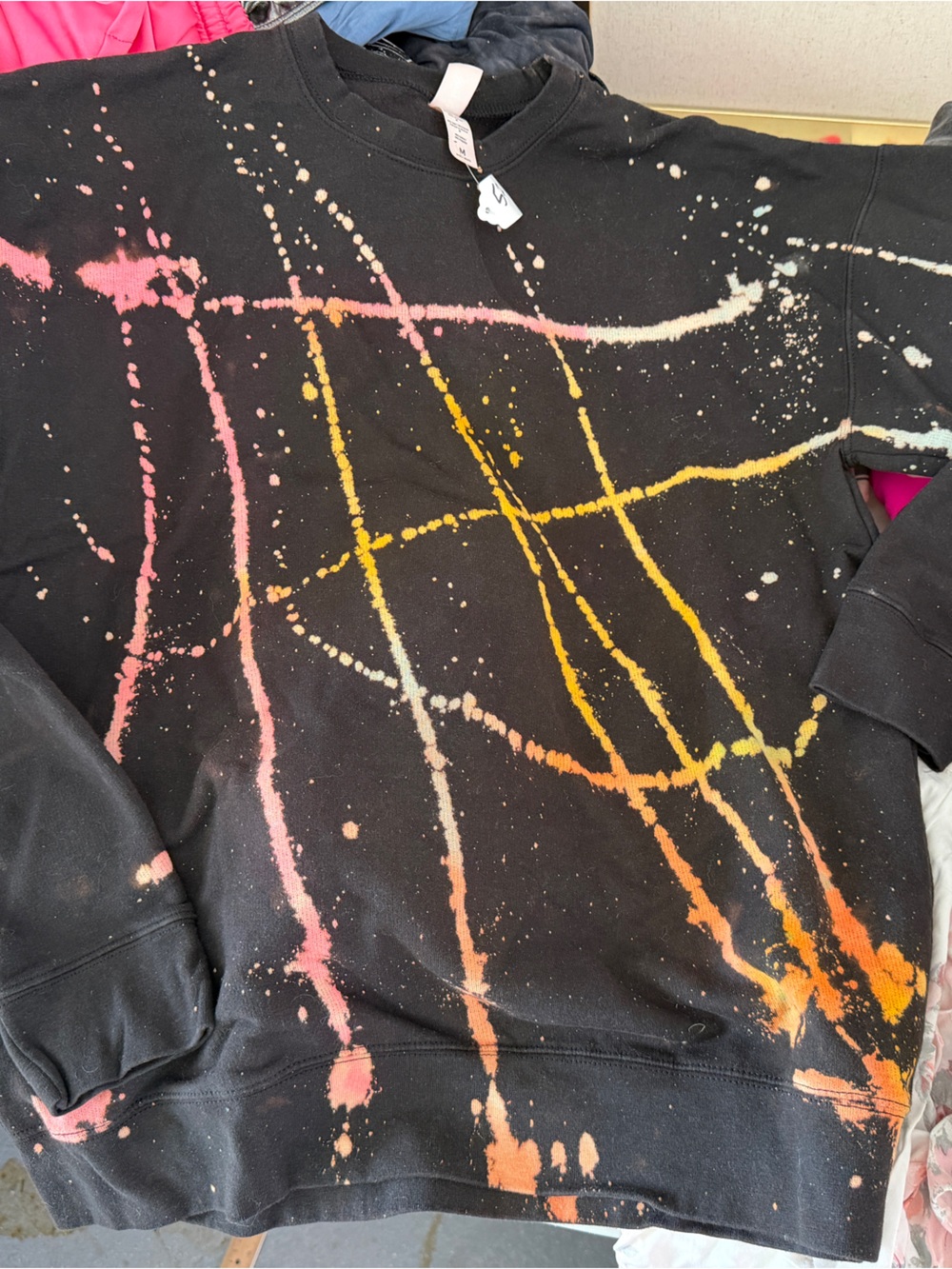 Black Crewneck Sweatshirt with Pink, Yellow & Orange Paint-Splatter Design